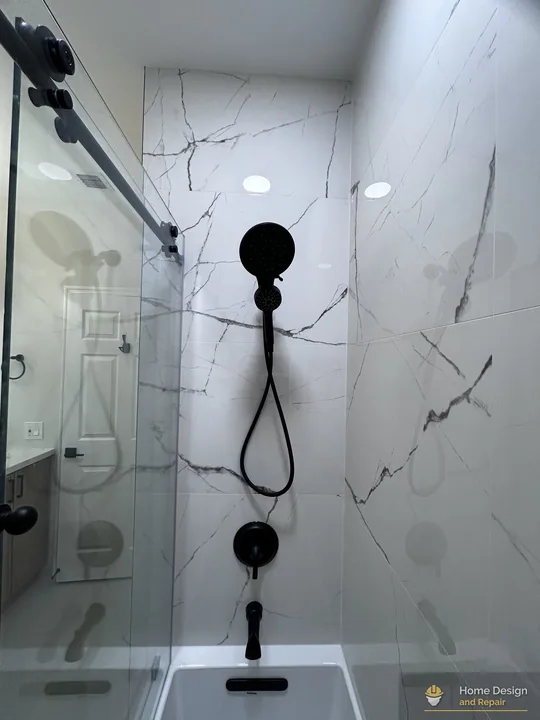 After detail of Marble-Look Tub Shower Remodel