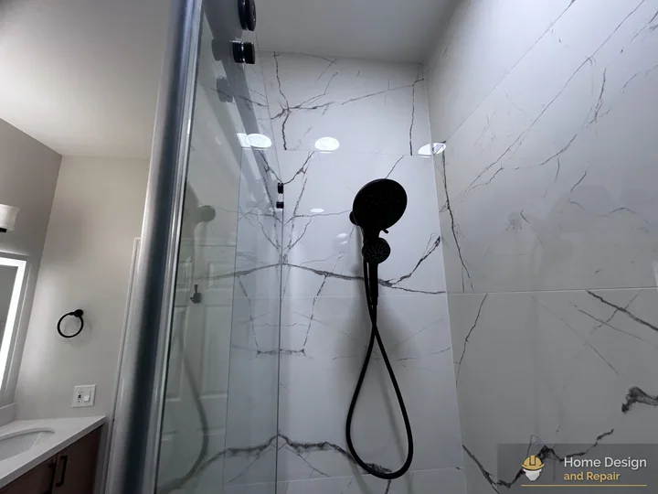 After detail of Marble-Look Tub Shower Remodel