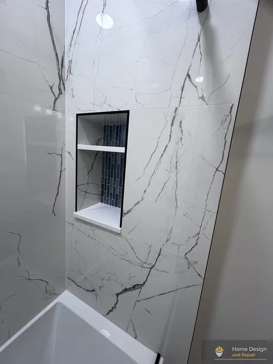 After detail of Marble-Look Tub Shower Remodel