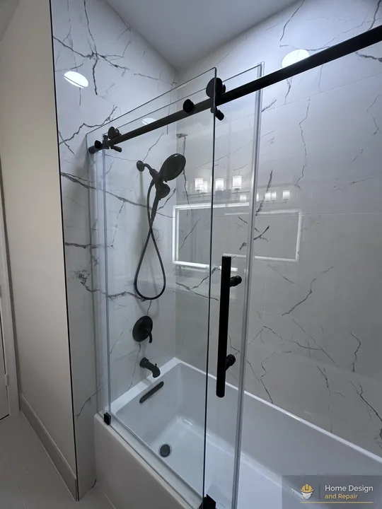 After detail of Marble-Look Tub Shower Remodel