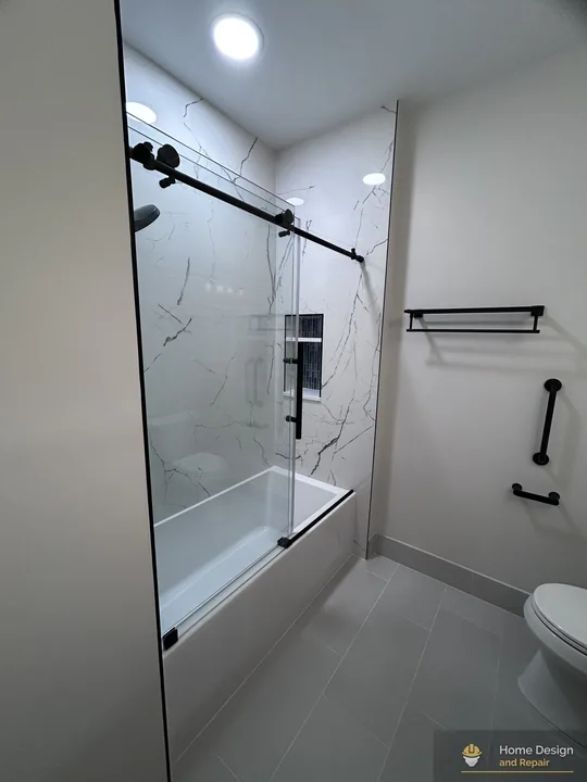 After detail of Marble-Look Tub Shower Remodel