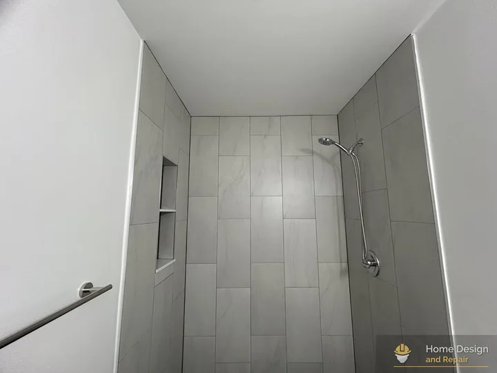 After detail of White Tile Walk-In Shower Remodel in Coral Springs, FL